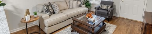 a living room with a couch and a coffee table