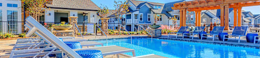 pool with tanning ledge at Creekside at Providence, Tennessee