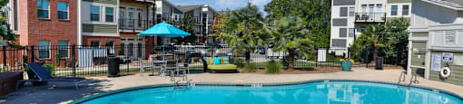 pool with lounge chairs
