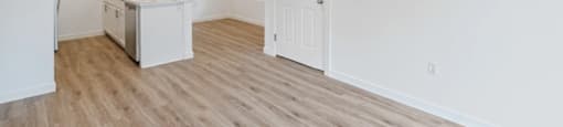 a kitchen and living room in a 555 waverly unit