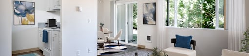 a living room with a white couch and a table