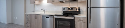 The Byway | #201 Modern Kitchen with Wood Cabinetry and Stainless Steel Appliances
