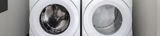 1 BR Apartments in Oregon City OR - Timberview Apartments and Townhomes - Laundry Room with Side-By-Side Washer/Dryer and a Storage Shelf Above