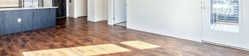 Living Room Come Kitchen View at Delo Apartments, Colorado, 80027
