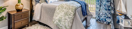 Bedroom With Expansive Windows at Aventine at Lantana - 55+ Active Adult Apartments, Lantana, FL