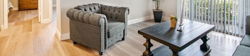 Living room with a couch at Aventine at Lantana - 55+ Active Adult Apartments, Lantana, 33462