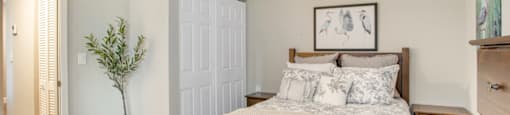 Bedroom with a bed at Aventine at Lantana - 55+ Active Adult Apartments, Lantana, Florida