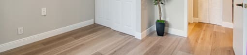 Empty living room at Aventine at Lantana - 55+ Active Adult Apartments, Lantana, 33462