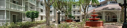 courtyard with a fountain at Aventine at Lantana - 55+ Active Adult Apartments, Lantana
