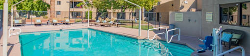 outdoor pool with seating and assisted lift