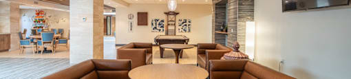 Brown leather couches at Palazzo Senior Apartments - 55+ Active Adult Apartments, Arizona