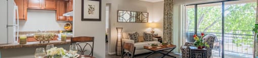 model bedroom with living area and kitchen
