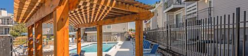 The Huntington Pool and cabana with seating