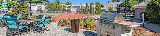 The Huntington outdoor BBQ grill and tennis court