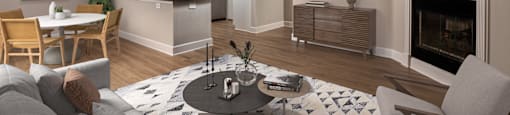 a living room and kitchen with a ceiling fan and a television