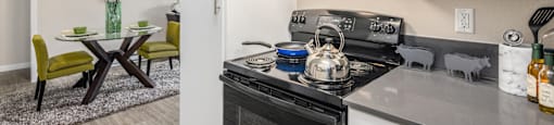 A modern kitchen with a black stove top oven and white cabinets.