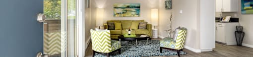 A living room with a yellow and green patterned sofa.