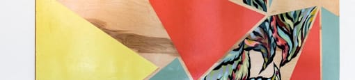 a wall hanging with a geometric painting on it at Arbora Court, Washington, 98105