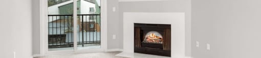 A room with a fireplace and a carpeted floor.