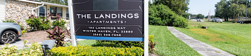 A sign for The Landings Apartments is in front of a building.