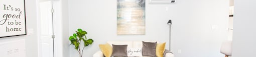 Rent in Winnipeg: a living room with white walls and a white couch