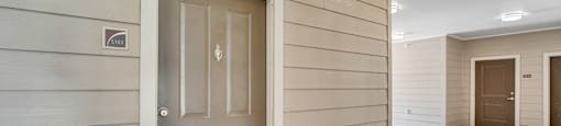 the front door of a house is open to a hallway with a door to a