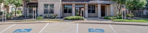 the preserve at ballantyne commons apartments exterior front of building with handicapped parking