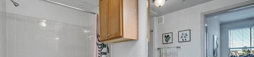 a bathroom with a sink toilet and a bath tub