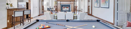 pool table and clubhouse at signature park apartments in Bryan, Texas