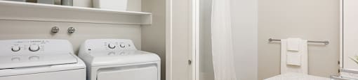 Bourg Du Village in-suite laundry with double bifold doors located in bathroom in Sainte Therese, QC