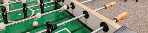 Glades on 55 games room featuring pool table and foosball table in Langley, BC