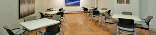 Prince Court Princess Manor in Welland, ON social room with tables and chairs