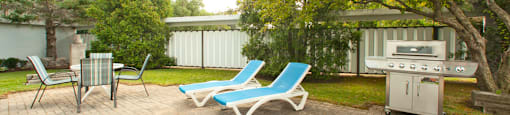 La Salle Towers outdoor lounge area featuring seating and BBQ in Burlington, ON