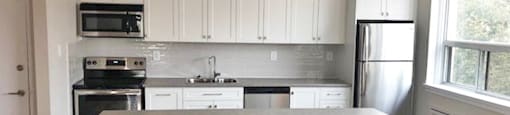 Berry Road in Etobicoke, ON kitchen with staineless steel appliances