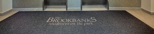 Brookbanks Clean entrance area with comfortable light and accessibility through a pair of elevators in Toronto, ON