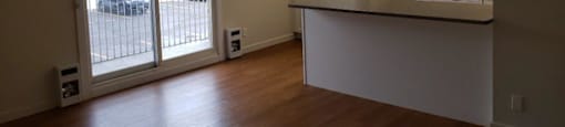 Open concept layout with refinished kitchen at Moira Apartments in Belleville, ON.