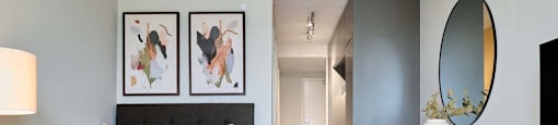 The Duke in Vancouver BC Modern open concept studio suite with a double bed, small dining table. and light wood flooring