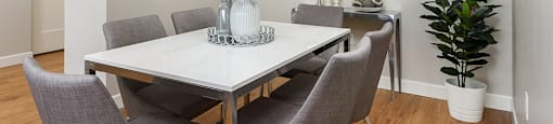 Bourg Du Village dining room area in open concept suite in Sainte Therese, QC