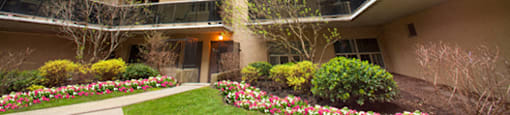 300 St. Clair Ave West in Toronto, ON Exterior highlighting professional level landscaping