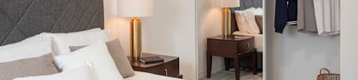 Bedroom showing closet with double sliding glass mirror doors in a one bedroom apartment at Bayfield Tower Apartments in Barrie, ON