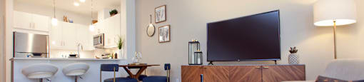 Watson Park Apartments open concept living area featuring view into kitchen in Guelph, ON
