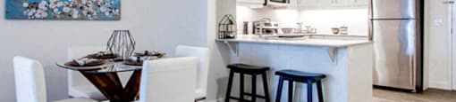 Open concept dining and kitchen at 99 Jasper in Edmonton, ON