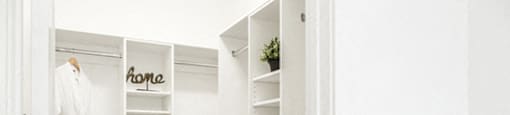 High end bedroom design and generous closet space at 99 Jasper in Edmonton, AB