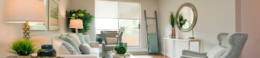Acton Apartments large, bright living room with access to balcony in Acton, ON