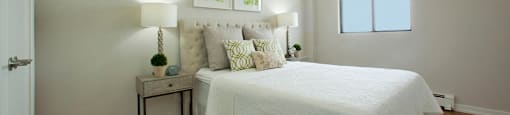 Albany Place bedroom with hard surface flooring in Fort Erie, ON