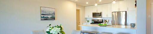Amesbury Gate Dining room with view of the kitchen in Bedford, NS