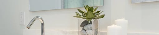 The Cliffs at Dellridge featuring a modern washroom with vanity and mirror in Bedford, NS