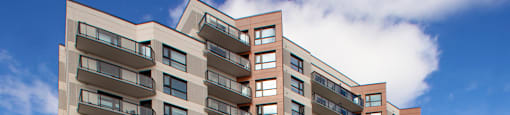 Exterior view of front of building at Bayfield Tower Apartments in Barrie, ON