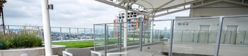 The Duke in Vancouver, BC Rooftop adult lounge with couch seating