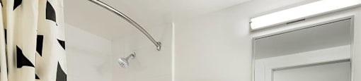 The Duke in Vancouver, BC Sleek bathroom with full size bathtub